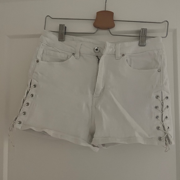 White denim shorts with suede ties - Picture 1 of 3